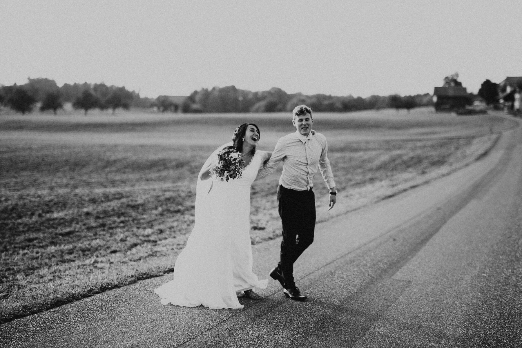 laughing wedding couple